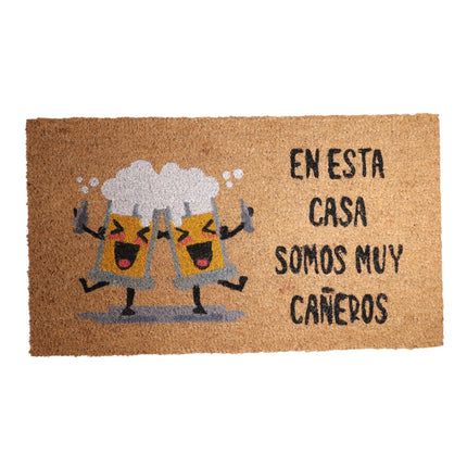 Felpudo Coco “En Esta Casa Somos Muy Cañeros” – 70×40 cm – Fibra de coco natural con base antideslizante PVC | Alfombrilla entrada interior/exterior protegido